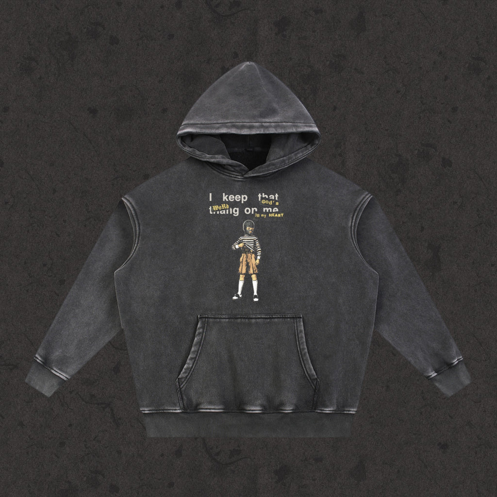 Oversized Retro Washed Hoodie in faded black with the Concealed Carry design, front view