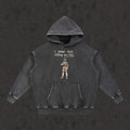 Oversized Retro Washed Hoodie in faded black with the Concealed Carry design, front view